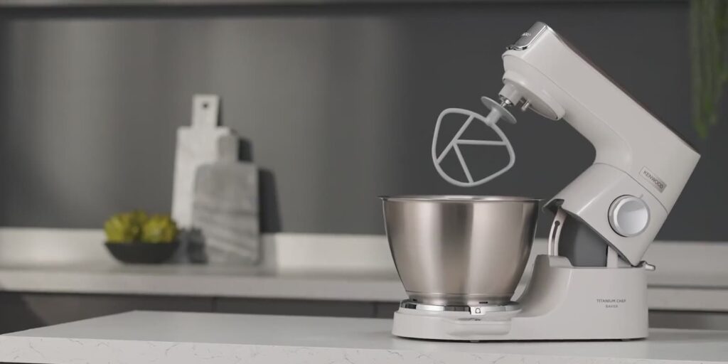 A Kenwood mixer, pasta maker and blender